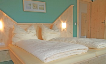 Schlafzimmer im Appartement "Grün", Gästehaus Sieder