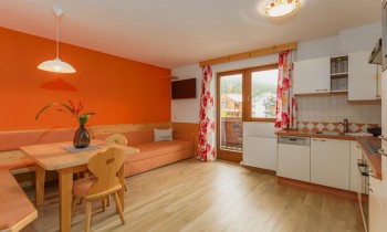 Wohnzimmer im Appartement Orange