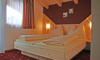 Schlafzimmer im Appartement "Rot"